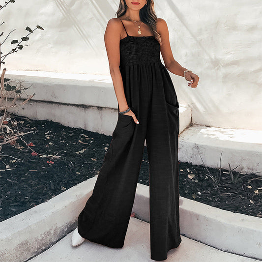 Dames jumpsuit met gesmokte top en wijde pijpen