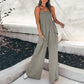 Dames jumpsuit met gesmokte top en wijde pijpen