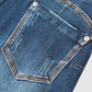 Capri-jeans met gescheurde, opgerolde zoom