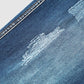 Capri-jeans met gescheurde, opgerolde zoom