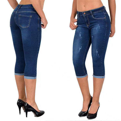 Capri-jeans met gescheurde, opgerolde zoom