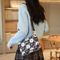 Crossbodytas met meerdere zakken en print voor dames