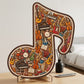 Houten puzzel met muzieknoten